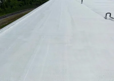 Top Notch Commercial Roofing team actively working on a commercial roof in Columbus, Ohio delivering reliable and efficient roofing services.