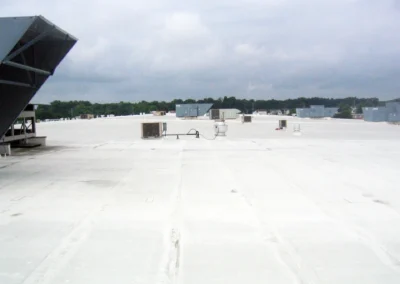 Top Notch roofing crew performing commercial roof repair work in Columbus, Ohio to fix leaks and restore structural integrity.